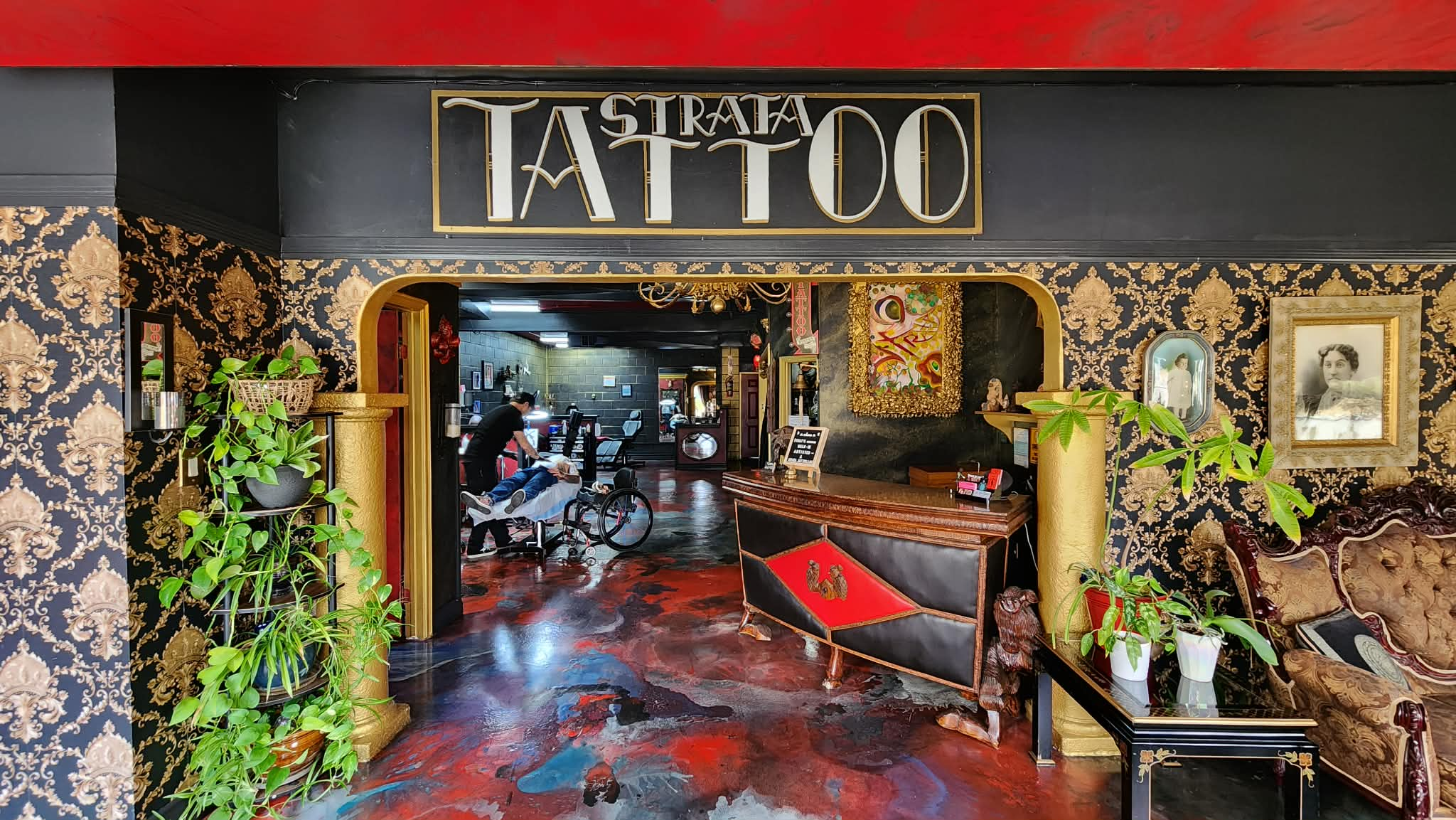 Wide view through the Strata Tattoo Lab reception area