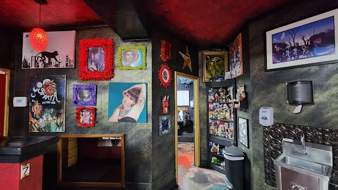 Original portraits and art displayed in the studio