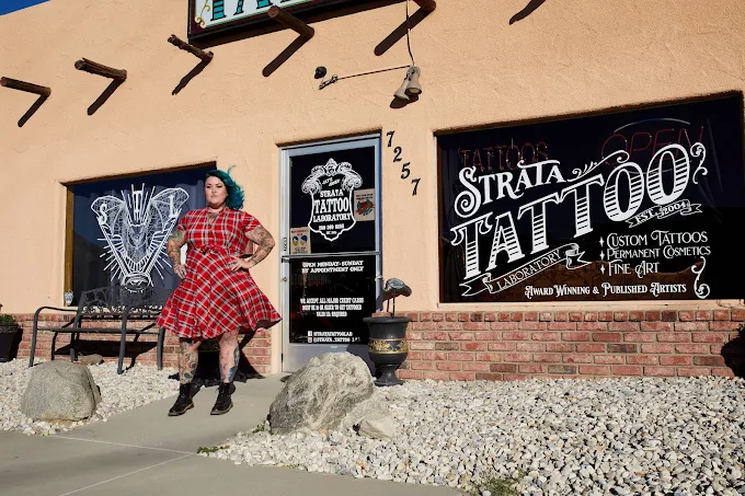 Artist standing outside the Strata Tattoo Lab entrance