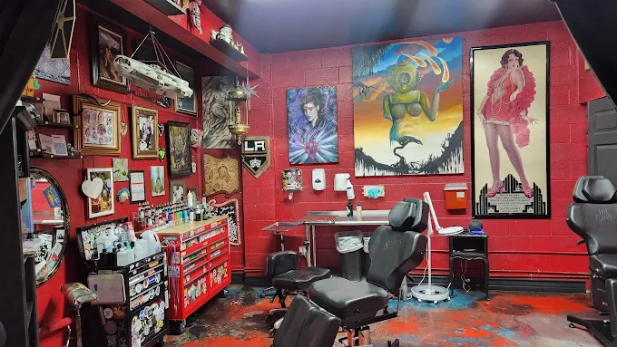 Red tattoo station filled with original artwork