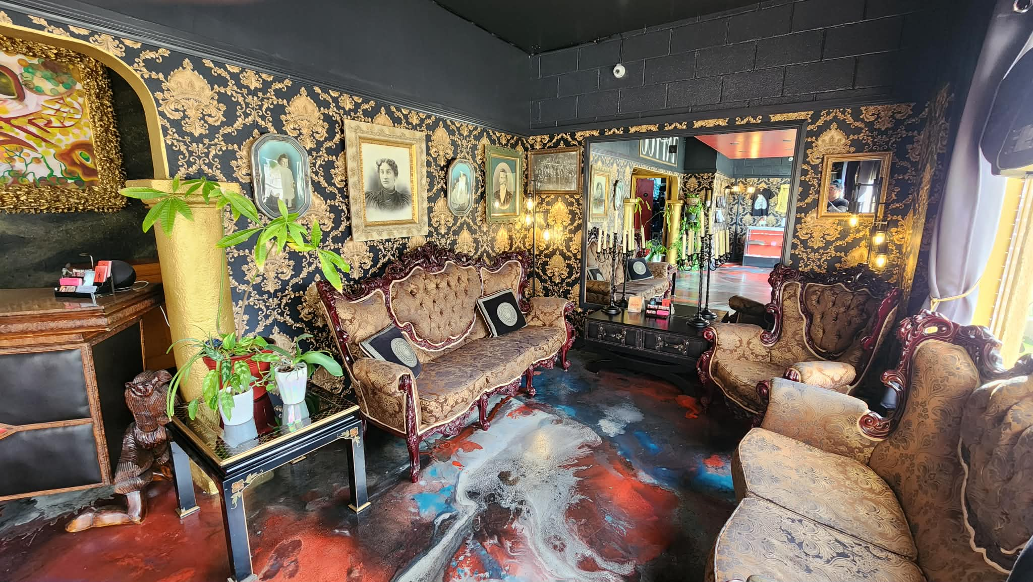 Ornate waiting area inside Strata Tattoo Lab